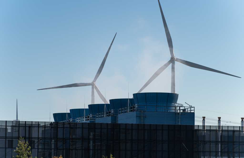 Heat emission from the chimneys of a large data and server complex.