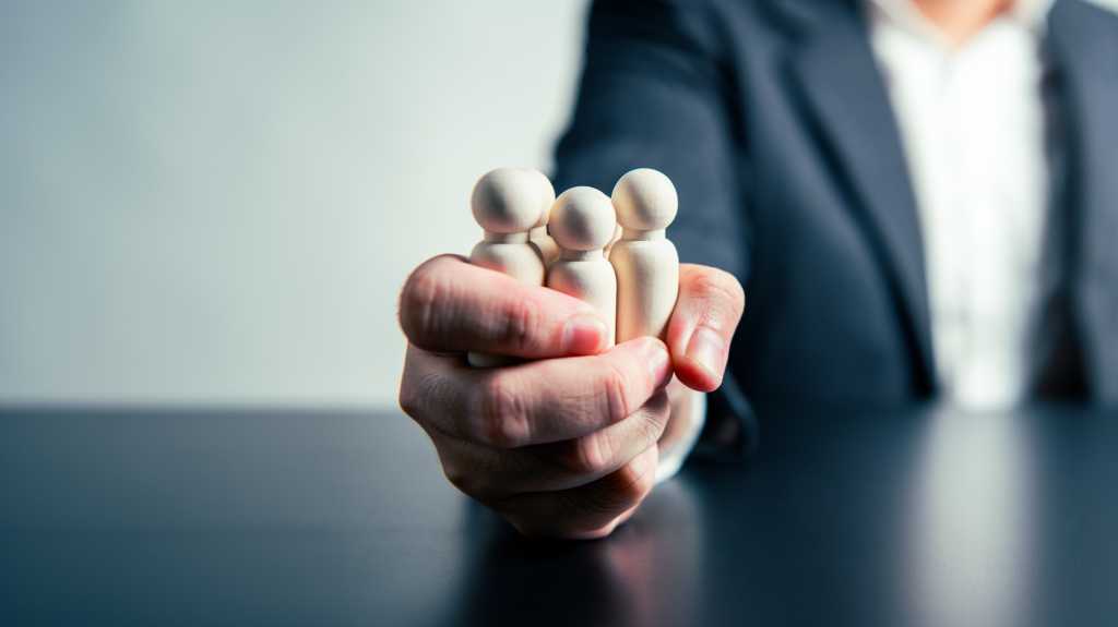 CEO Influence  Business Agreements and Employee Dismissals workforce labor businessman hand background. Tyrant and corruption concept. 2325646331 squeeze